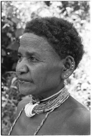 Portrait of &#39;Etenga wearing tale&#39;ekobi necklace on &#39;afi&#39;afi shell beads.