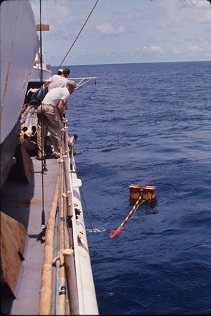 Retrieving an instrument buoy, aboard the USC&amp;GS Pioneer during the International Indian Ocean Expedition. 1964