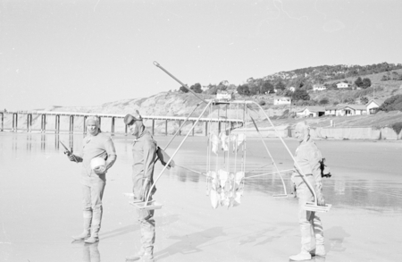 A early suspended sediment trap being taking into the ocean by some Scripps Institution of Oceanography staff, near the in...