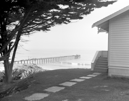 A beach and Scripps pier view at Scripps Institution of Oceanography near the front of the original library building. Circ...