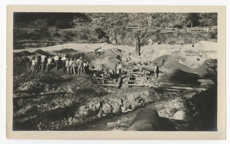 Laying steel pipe for repairs to the San Diego flume following the 1916 flood