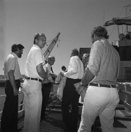 San Pedro Portcall, September 25, 1978 [Richard Atkinson and William A. Nierenberg shake hands on deck of Glomar Challenger]