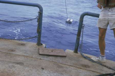 Putting out long seismic array. Onboard R/V Thomas Washington, Indopac Expedition. July 21, 1976