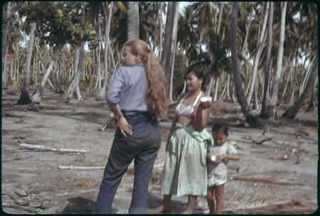 Ann Rappaport with local Chinese woman and child, at ti&#39;i site, Maatia, Moorea