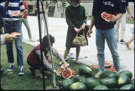 Students eating watermelon at Watermelon Drop