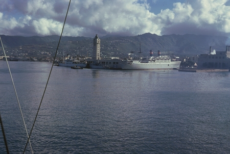 During the Swan Song Expedition (1961) a member of the crew took this photo of the Aloha Tower and the Russian R/V Vitiaz ...