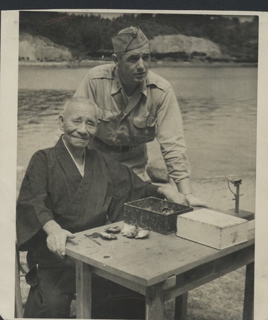Claude M. Adams with Kokichi Mikimoto, the father of the cultured pearl industry. Japan, 1946