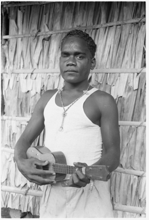 Seda, eldest son of Folofo&#39;u and Boori&#39;au, of Uka&#39;oi, with swollen eye and ukulele.