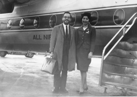 Joseph L. Reid  at Hakodate Airport, enroute to Tokyo, with flight attendant Miss Kawakami