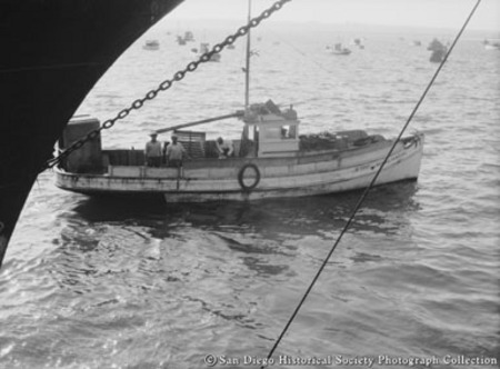 Fishing boat Rosalia Madre on San Diego Bay, ship&#39;s hull on left