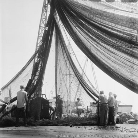 Hoisting fishing nets on the Embarcadero