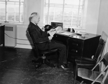 Man at desk, University of California Division of War Research