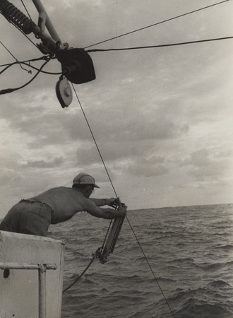 Dick Coolidge retrieving hydrographic cast