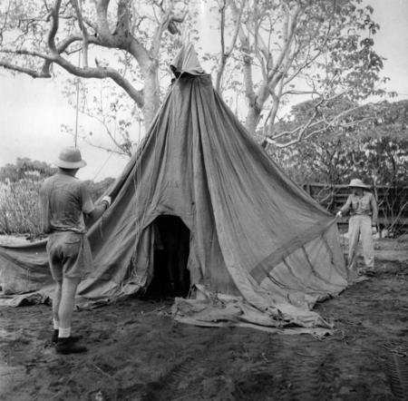 Jeff Holter and Martin Johnson set up camp &quot;Abstain I&quot; on Ennimen Isle, Bikini Atoll. . Capricorn Expedition, October 22, ...