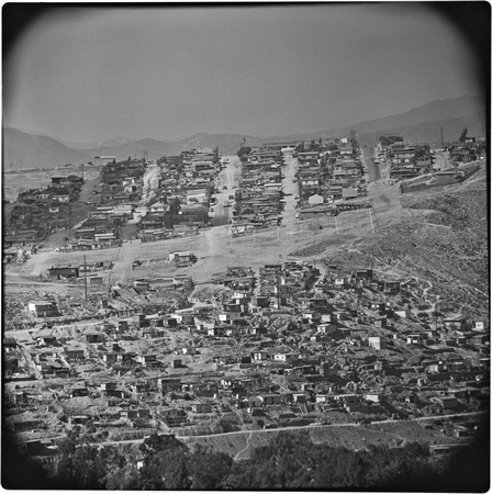 Hillside on the east side of the Tijuana River Valley. Subdevelopment at the top of the photograph, on the edge of Mesa de...