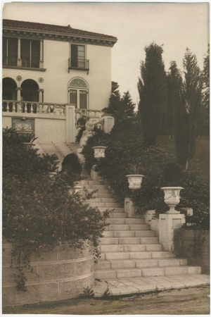 Stairs leading up to Italianate-style home