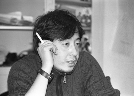 Jia Zhangke in his Beijing studio in 2001 3 of 3