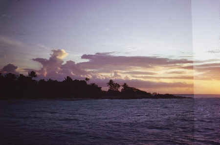 Bikini Island at sunset during the Capricorn Expedition. 1952.