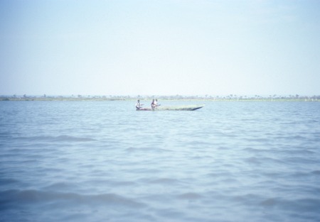 Fishermen on Lake Mweru Wantipa, dugout boat