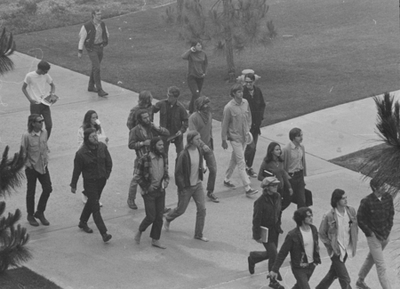 Students protesting against the Vietnam War, marching towards Urey Hall, UC San Diego