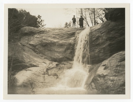 Ed Fletcher with man at waterfall