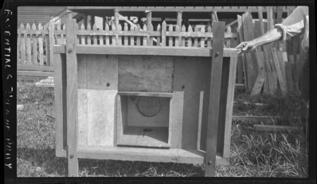 Wooden seat and frame for latrine, constructed for hookworm prevention