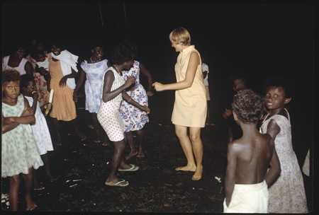 Women and children dancing with Anne Scheffler