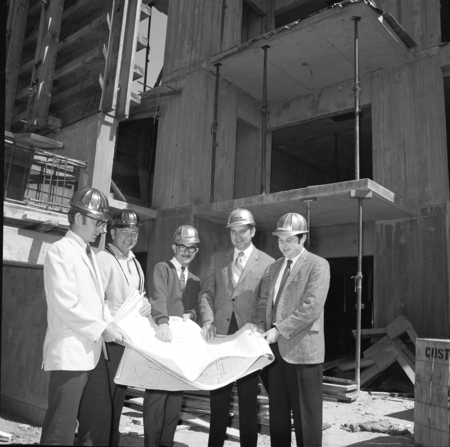 William Loy (architect), Don McCarty (architect), Col. John Carrol (engineer), Steve Koonce (engineer), and unidentified m...
