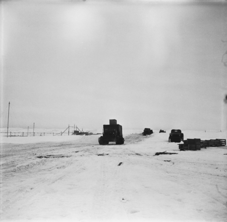 Vehicles on ice Main Street or Road