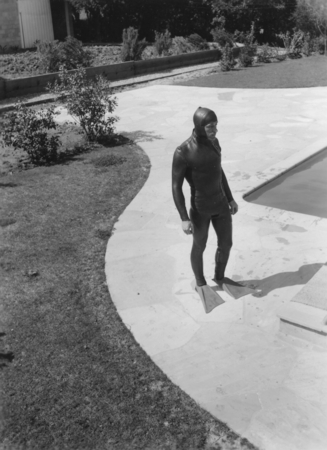 John S. Foster modeling early wet suit design