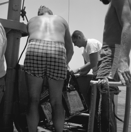 [Men with dredge on deck of R/V Spencer F. Baird]