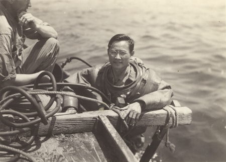 C. K. Tseng in a diving suit at Laguna Beach, California. C.K. Tseng would later be known Zeng Chen-Kui a marine biologist...