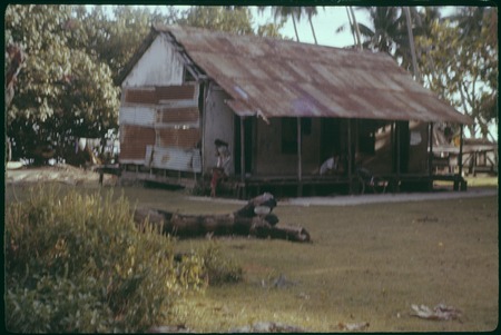 House built from corrugated metal, Papetoai, Moorea