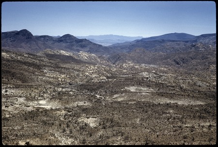From summit on road to Santa María Mission, Sierra San Luis in distance, old trail in middle distance