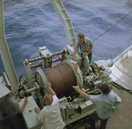 Repairing winch wire: lower right is Frank Fish, Chief Engineer and crew members