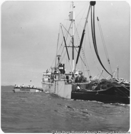 Tuna boat Normandie with net skiff on port side