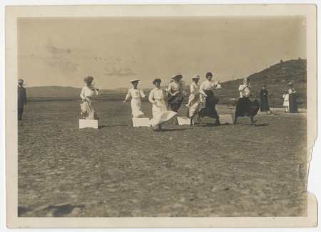 Women&#39;s hurdle race at Del Mar beach