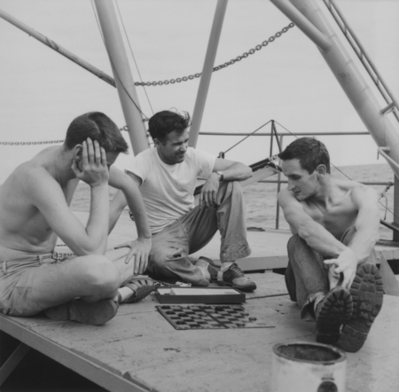 Winter Horton, Warren W. Beckwith, and Miles M. Payne play checkers, R/V Horizon
