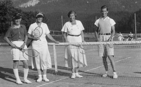 Walter Munk as a young man, with tennis players on his grandfather&#39;s clay courts in Alt Aussee, Austria