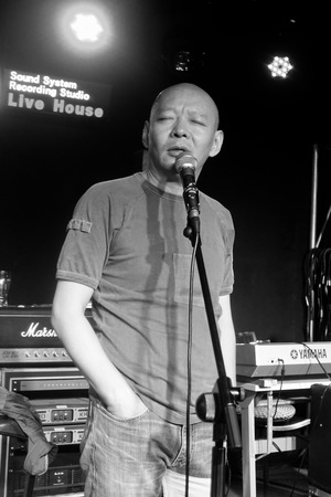 Yue Minjun singing the blues in a music studio in Songzhuang art colony 9 of 11
