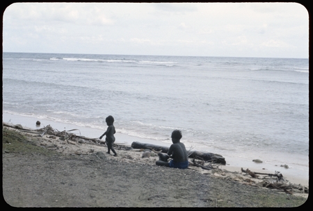 Woman and child on beach
