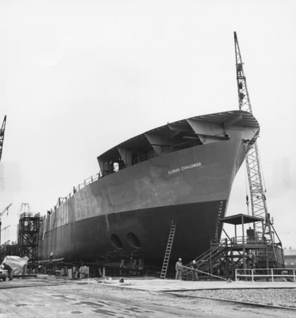 Starboard bow view of Glomar Challenger on ways just prior to launching 23 March 1968. Visible in hull are bow thruster tu...