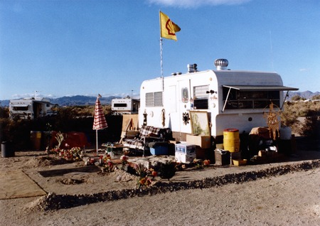 Slab City: photograph of trailer home with garden