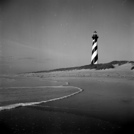 View of the light house on Cape Hatteras before the light house was moved in 1999. Cape Hatteras is a cape on the coast of...