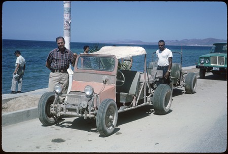 Bill Rawls and Les Hazerot with dune buggies, La Paz