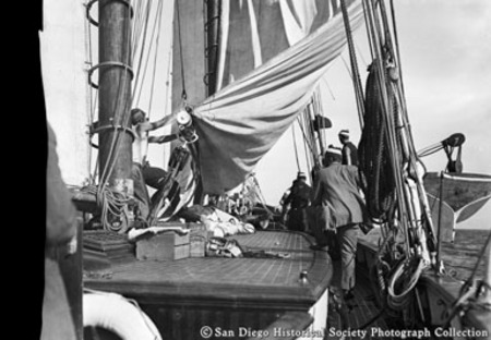 Crew at work on deck of John D. Spreckels&#39;s yacht Lurline