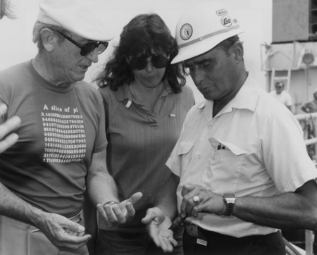 Oceanographer Henry William Menard (left) and Captain Schuman (right) discuss the loss of the lower half of a stinger on a...
