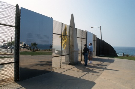 Picturing Paradise: Border fence with mirrored surface