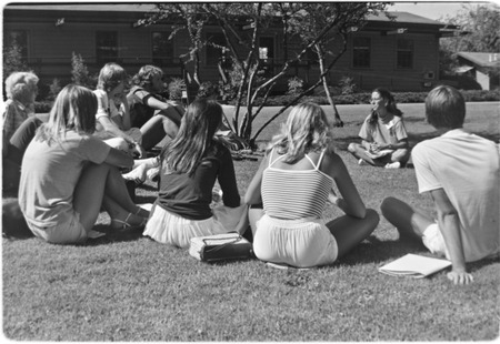 Students meeting on lawn on Matthews Campus