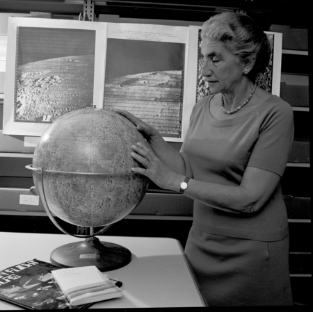 Gertrude Weiss Szilard with lunar maps and moon globe, UC San Diego